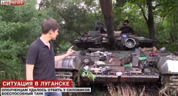 При захвате бойцами ЛНР командир украинского танка застрелил своего подчиненного (видео) | Русская весна
