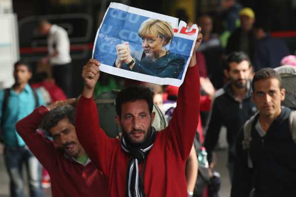 bezhency_i_merkel_0.jpg?itok=SNhIlpxF