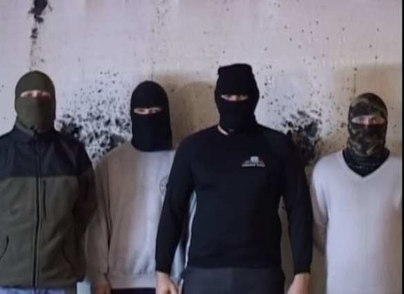 В сети размещено видео, где группа граждан в масках, называющая себя «украинскими партизанами», заявляет, что будет убивать мирных жителей российских городов | Русская весна